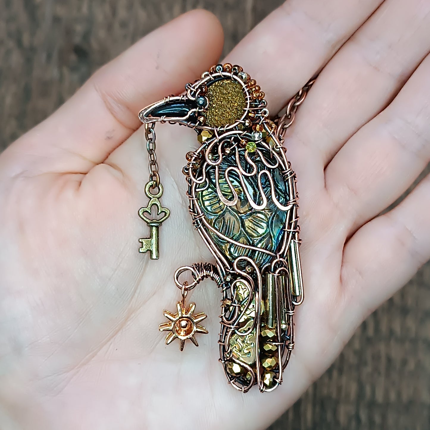 Secret keeper and The Sun. Raven necklace.