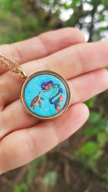 Mini reversible Mermaid and sea turtles pendant.