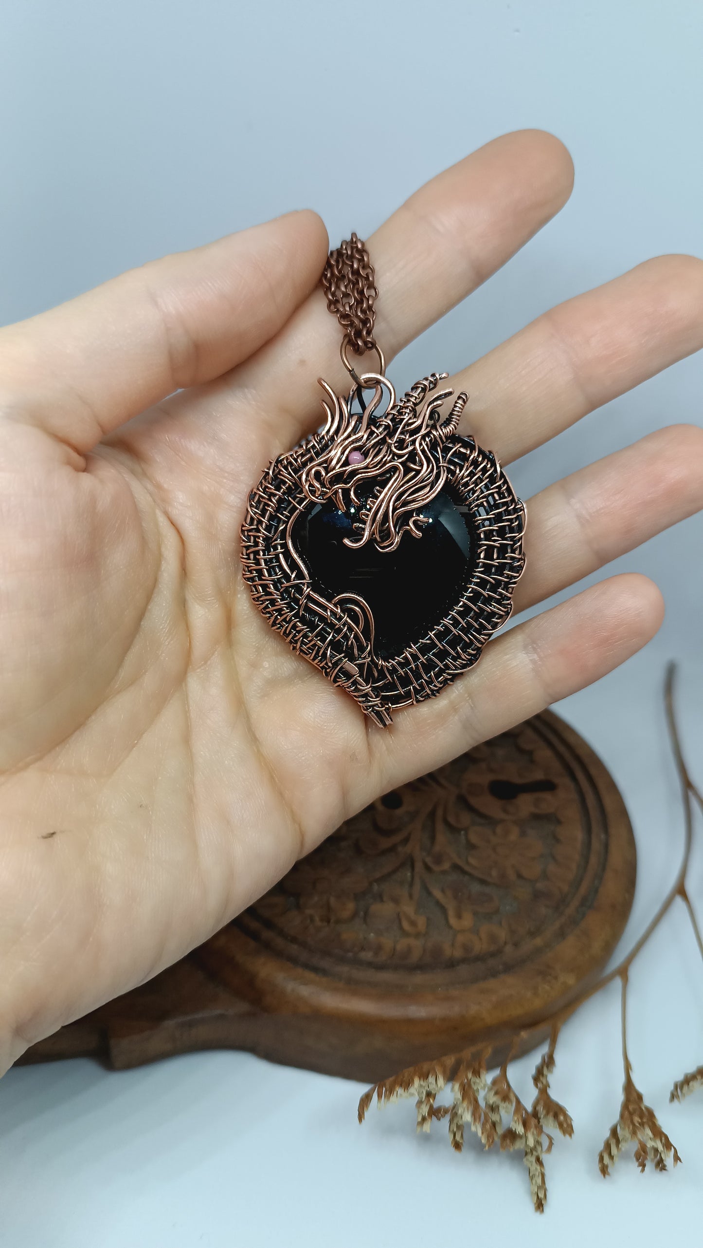 Black obsidian dragon pendant.