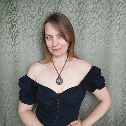 Carved leo labradorite necklace.