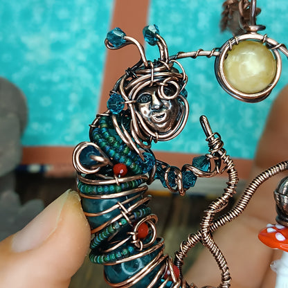 Blue caterpillar necklace