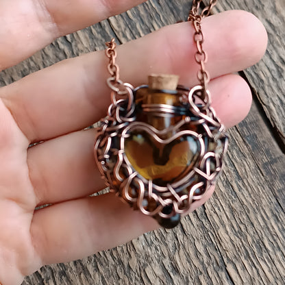 For Susan. Paw vial pendant