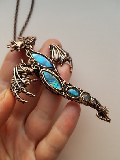 Dancing in the sky. Blue dragon with open wings. Copper pendant.