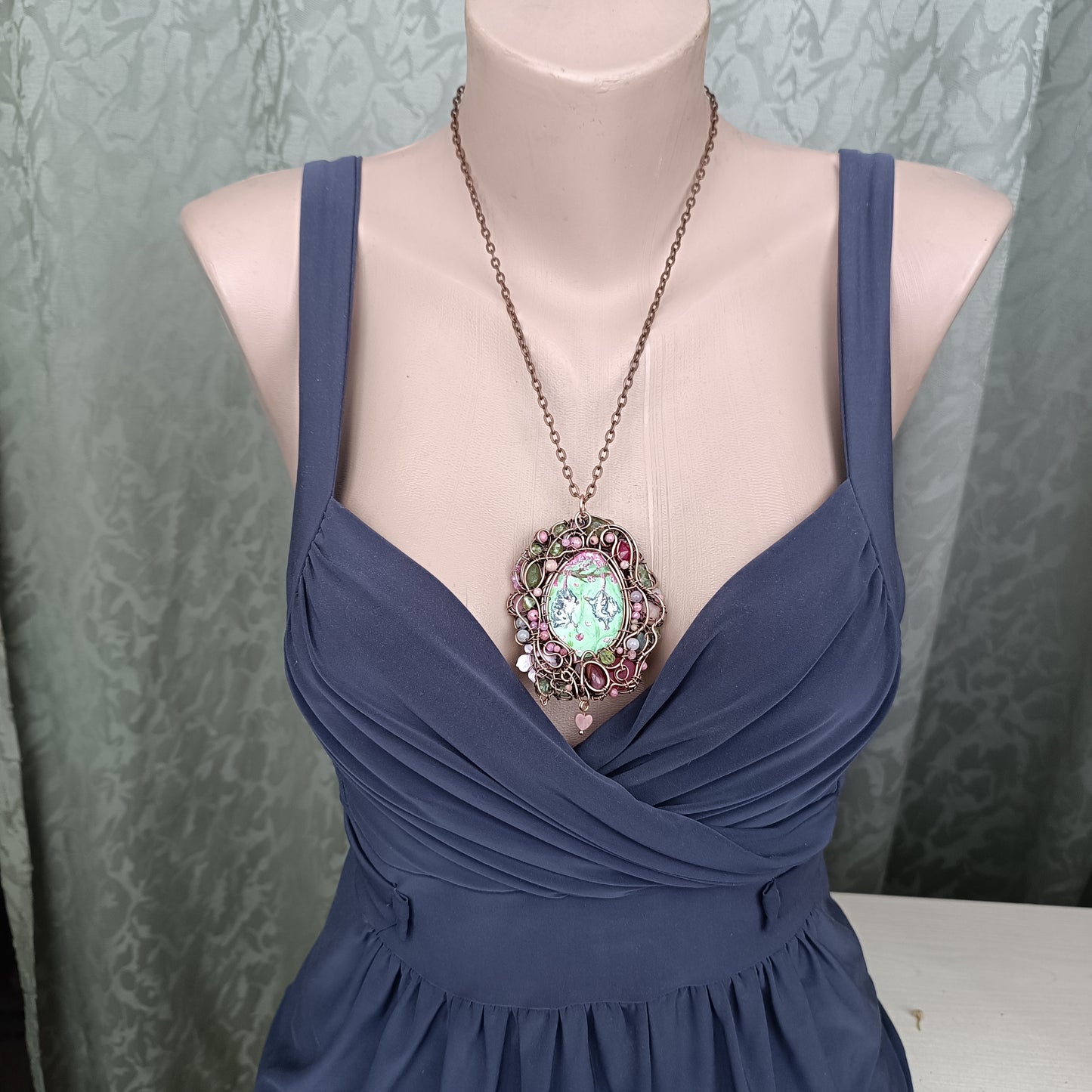 Charming possums and cherry blossom. Wire wrapped 2 sided necklace with miniature paintings