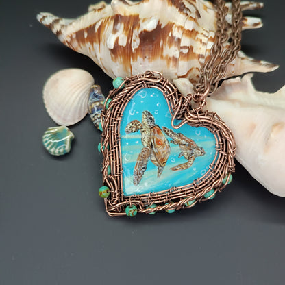 Heart of the ocean. Wire wrapped hand painted necklace. Reversible.