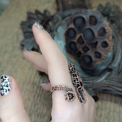 Raven ring.