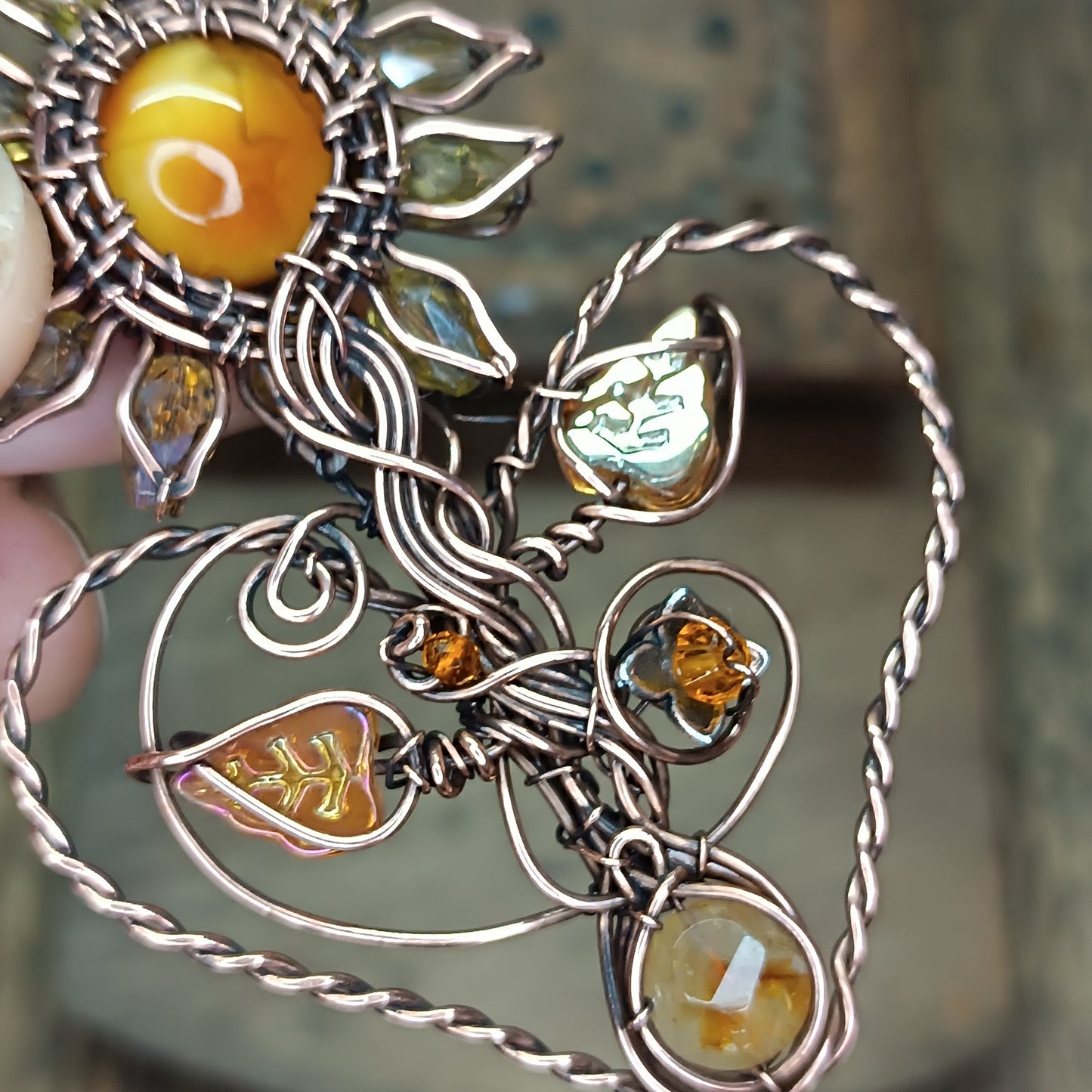 Sunflower pendant with citrine root.