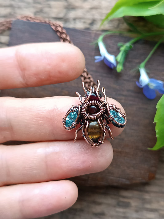 Tiny blue sparkle wings bee charm.