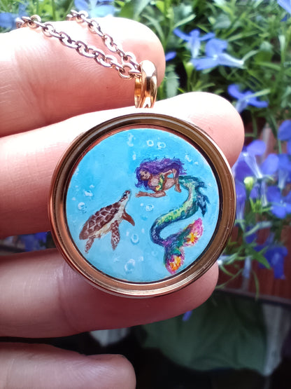 Mini reversible Mermaid and sea turtles pendant.