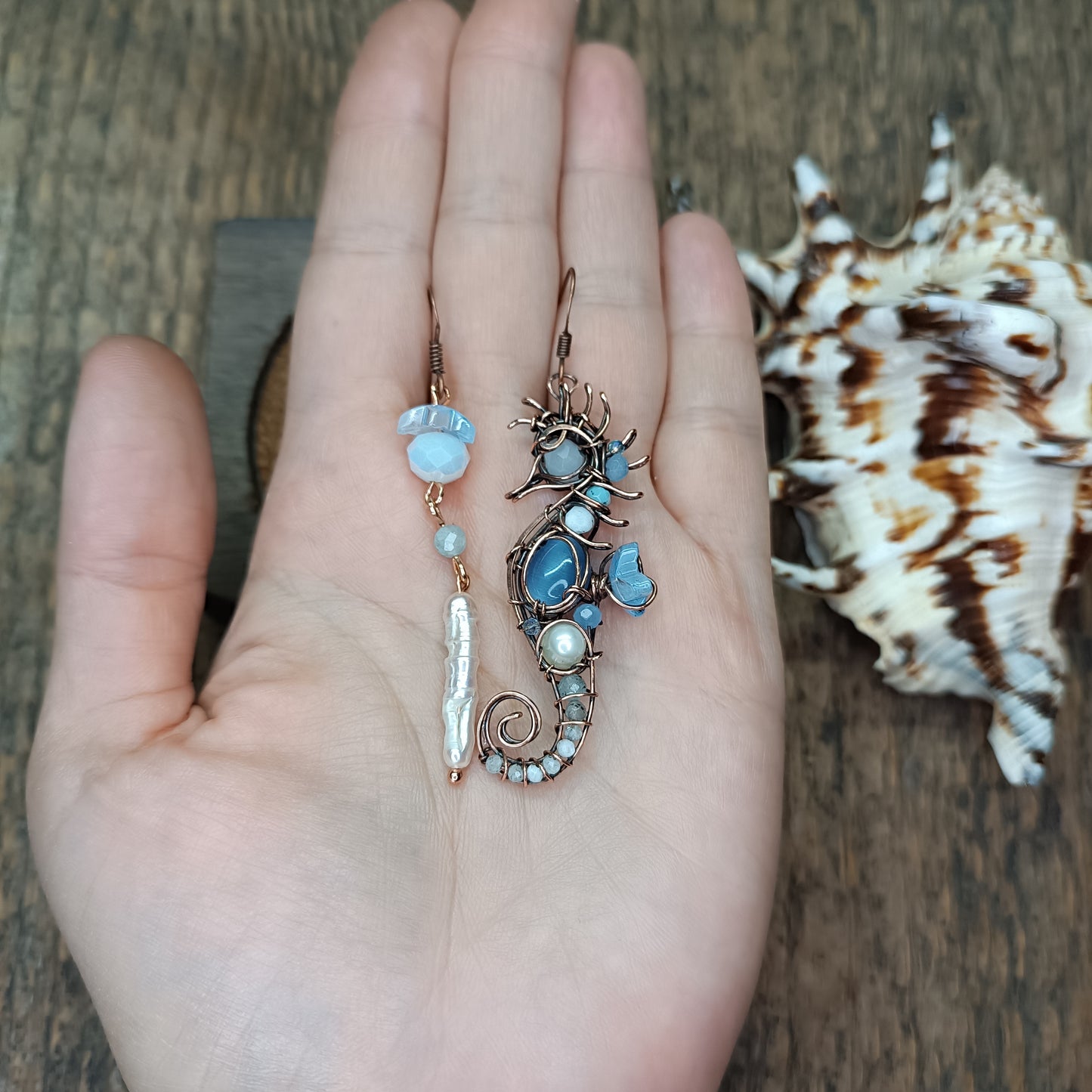 Blue and white seahorse earrings
