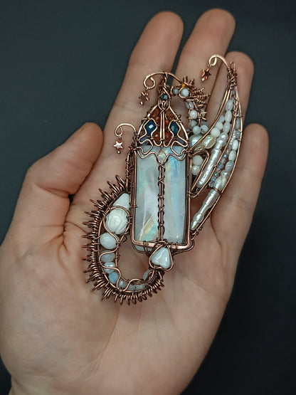 The ballad of the Pearl Dragon and the Moonstone Castle. Wire wrapped necklace