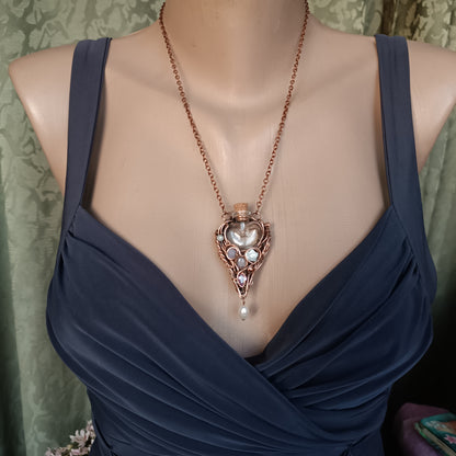 Whispering Dawn. Vial necklace