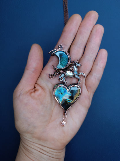 Space unicorn necklace.