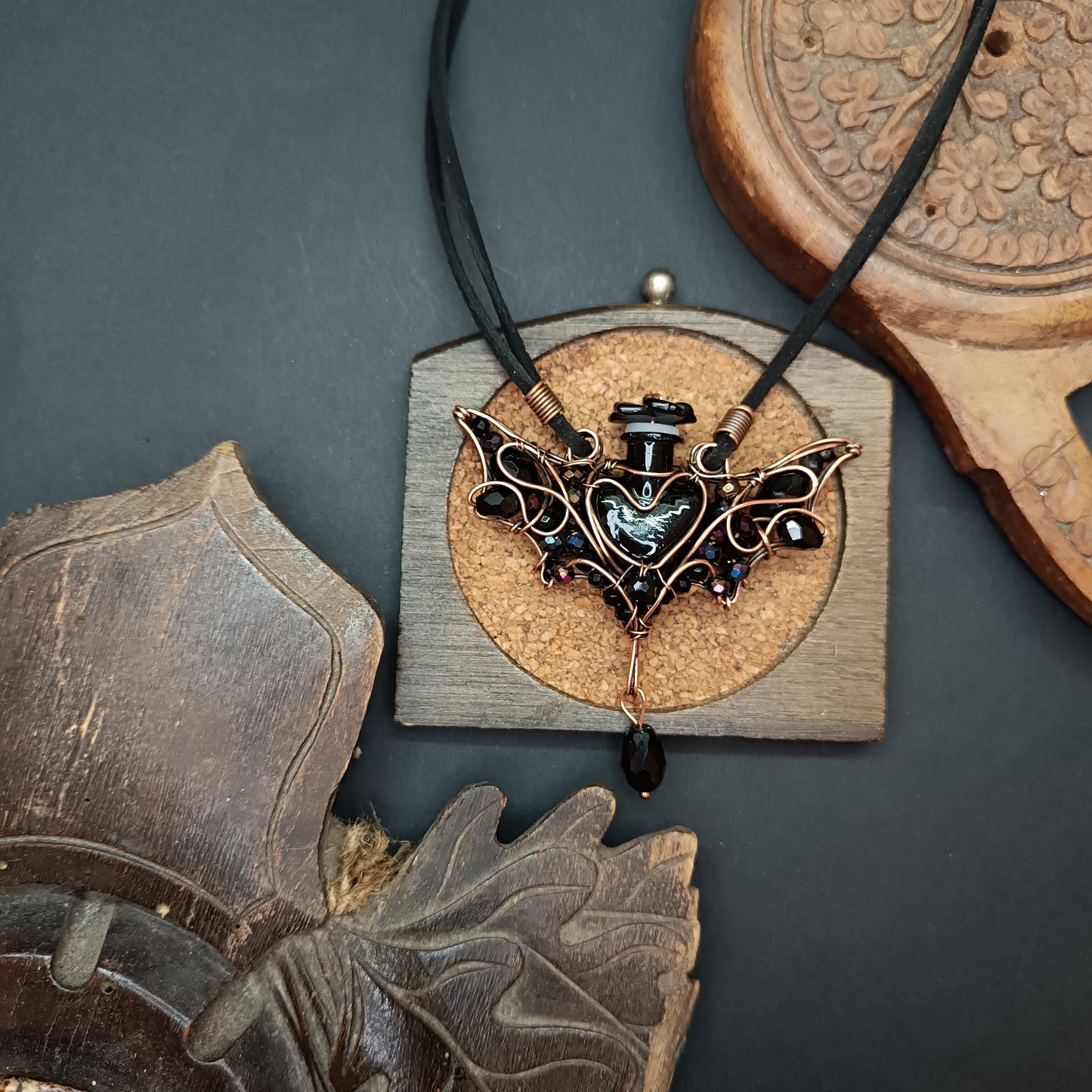 Black (with some purple) bat bottle necklace