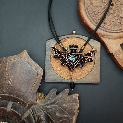 Black (with some purple) bat bottle necklace