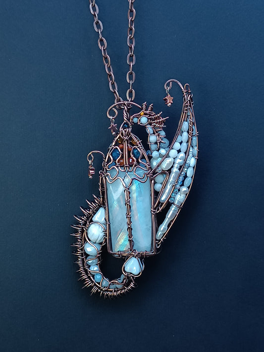 The ballad of the Pearl Dragon and the Moonstone Castle. Wire wrapped necklace