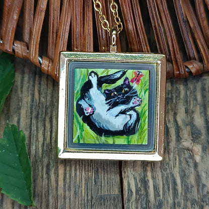 Cats sunbathing. Hand painted pendant.