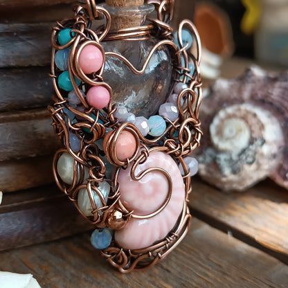 Heart of the ocean. Reversible vial necklace