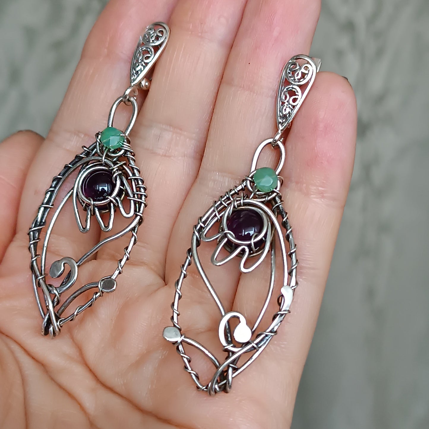 Silver dangling earrings. Amethyst bells.