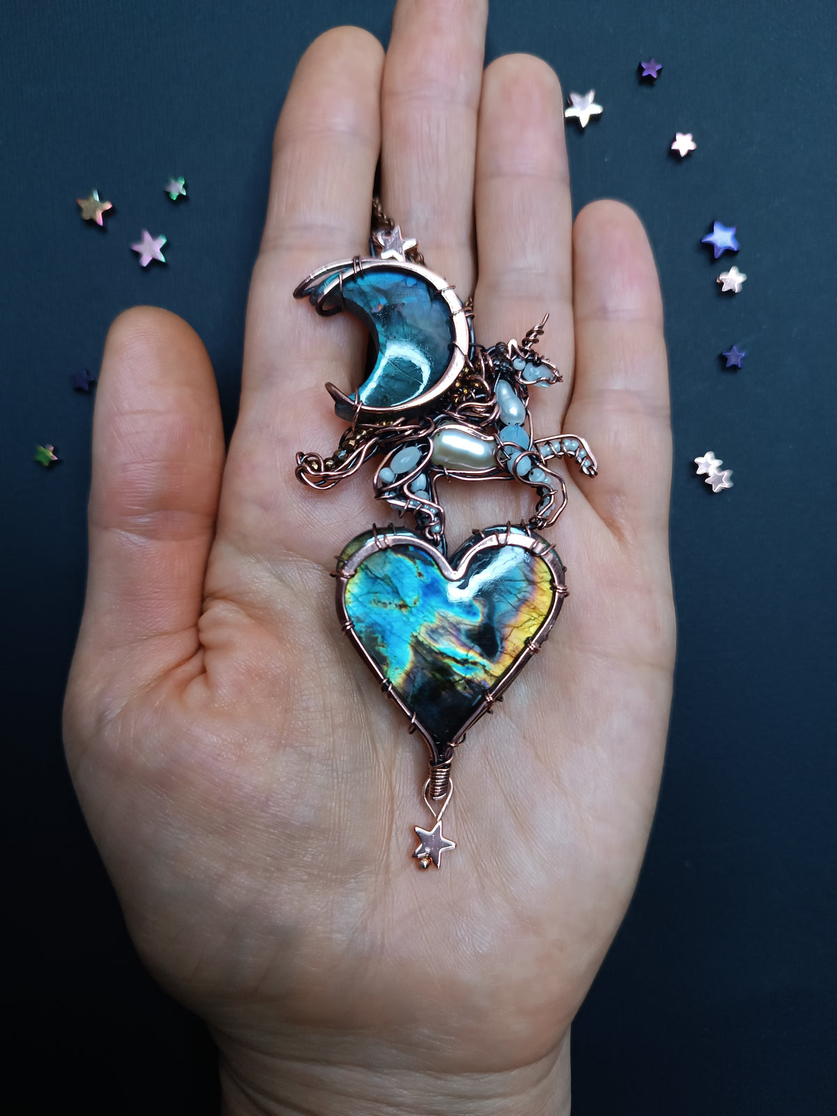Space unicorn necklace.