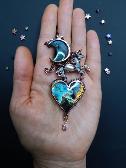 Space unicorn necklace.
