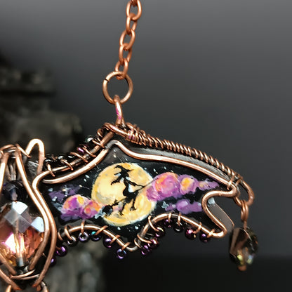 Halloween story. Painted bat necklace