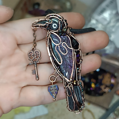 Magestic raven with the purple wings!