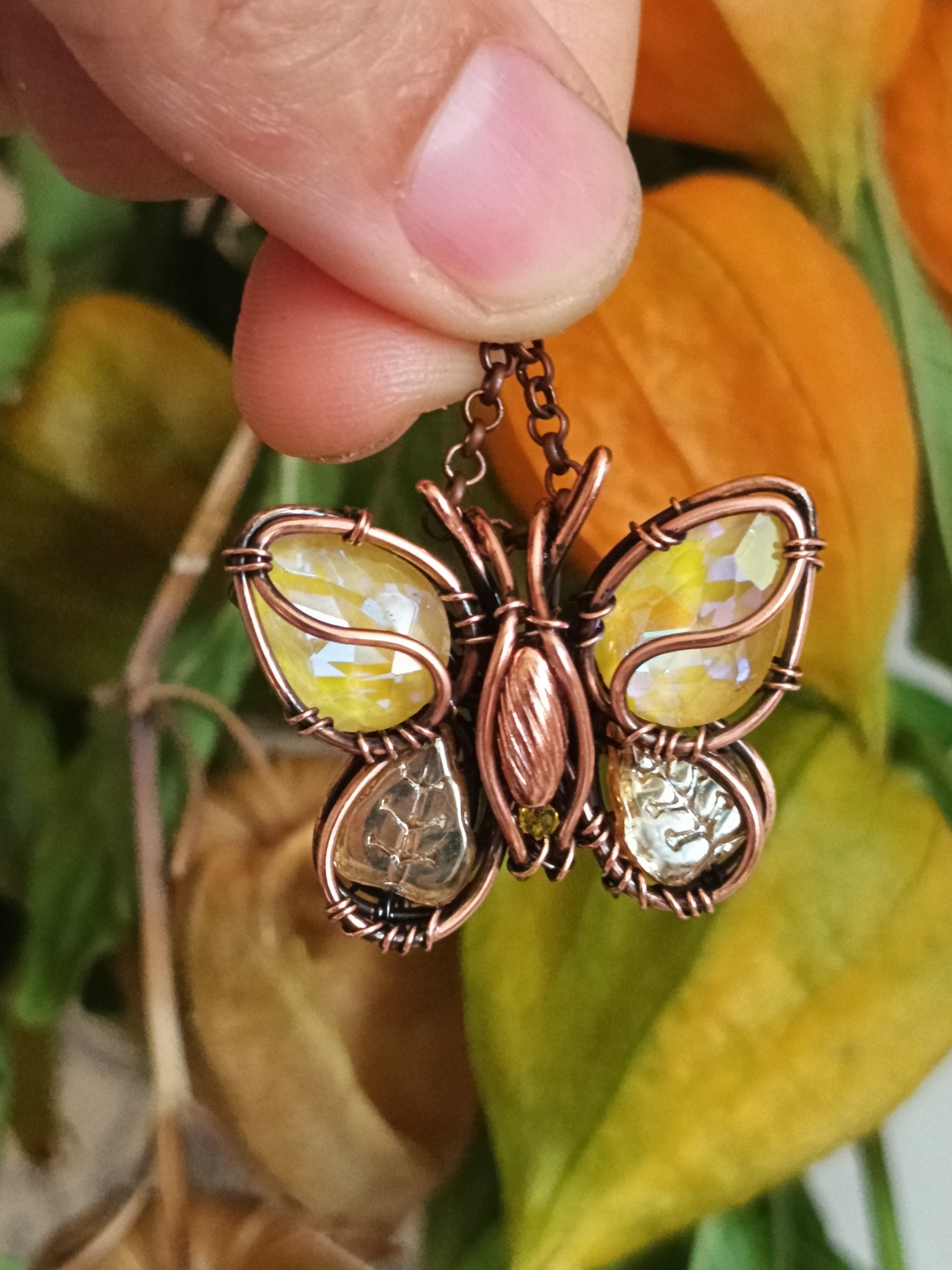 Yellow sparkling butterfly charm