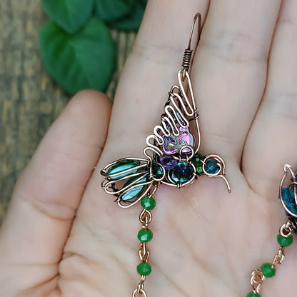 Humming bird and flower dangling earrings.
