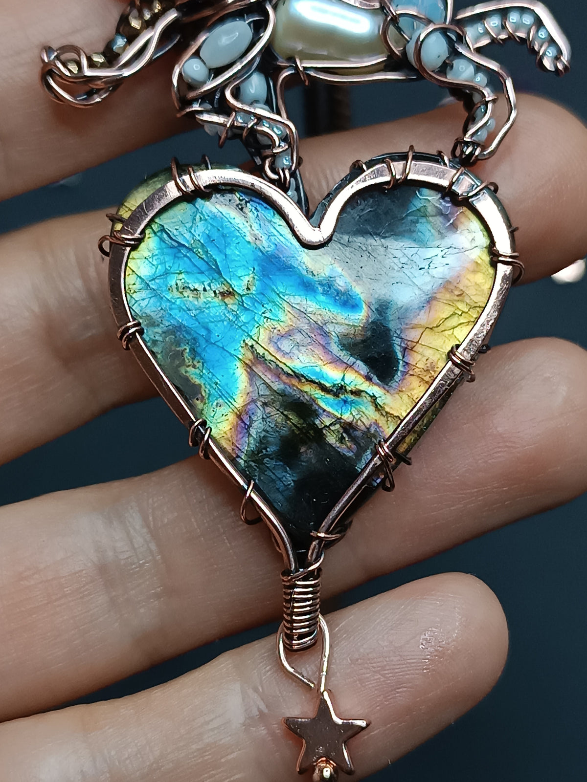 Space unicorn necklace.