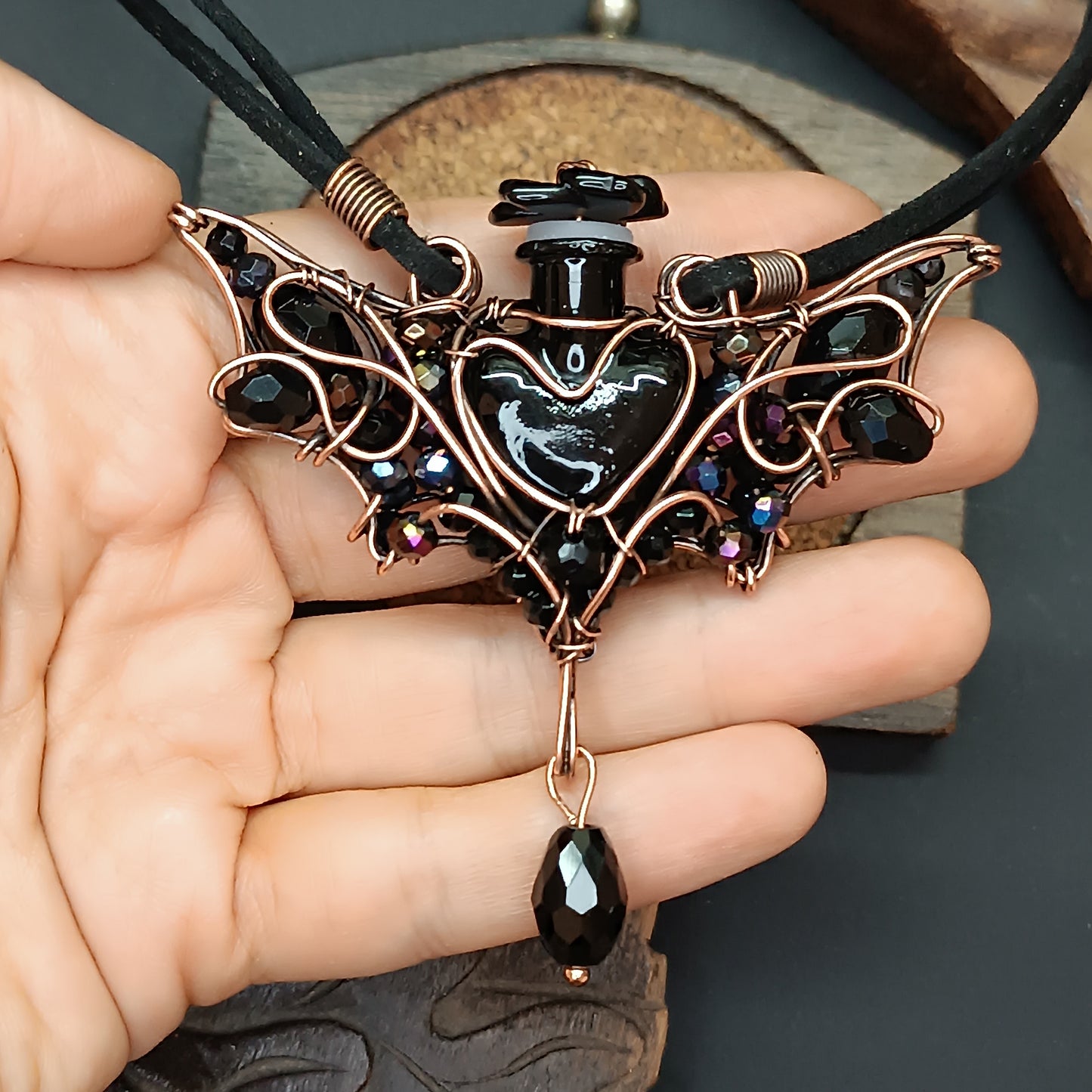 Black (with some purple) bat bottle necklace