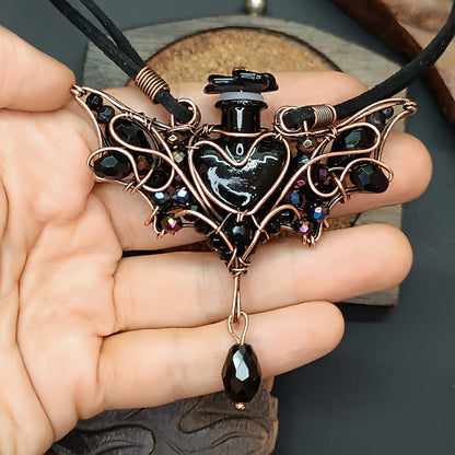 Black (with some purple) bat bottle necklace