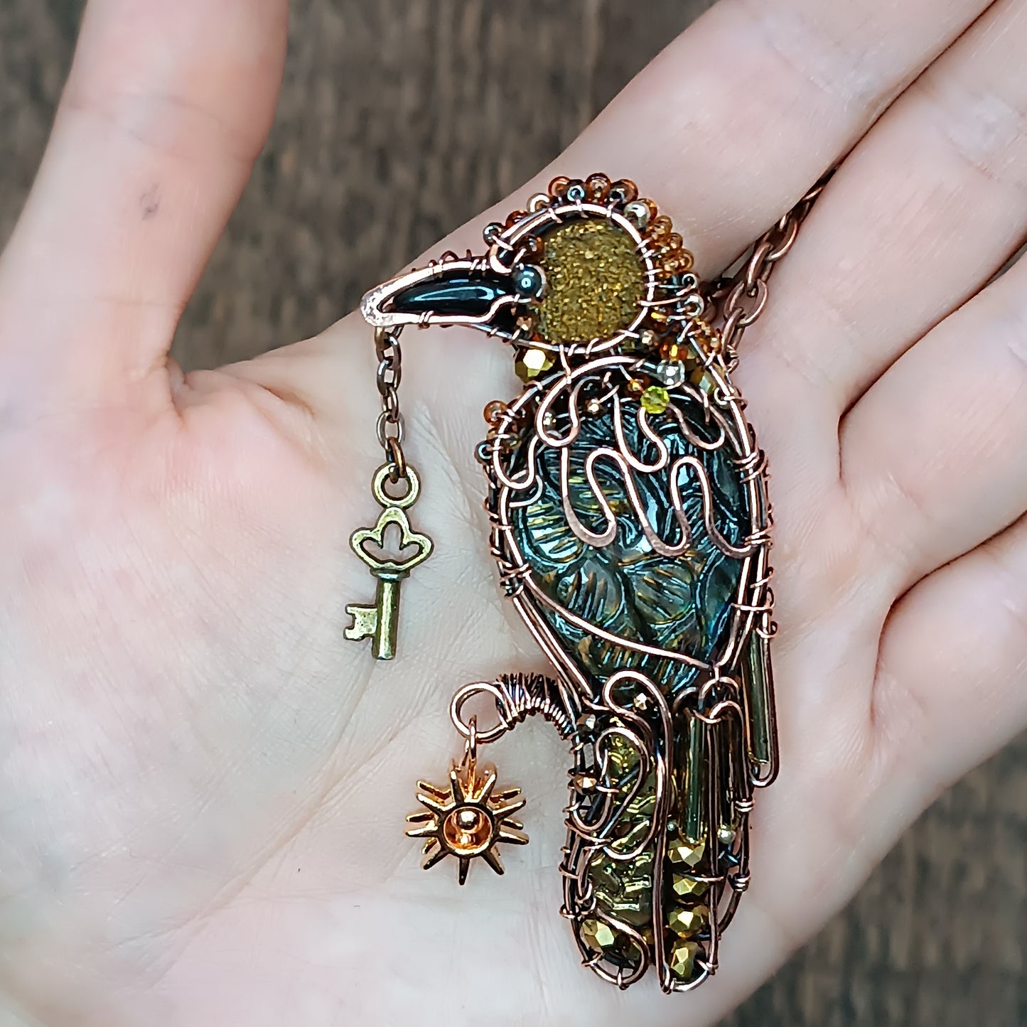 Secret keeper and The Sun. Raven necklace.