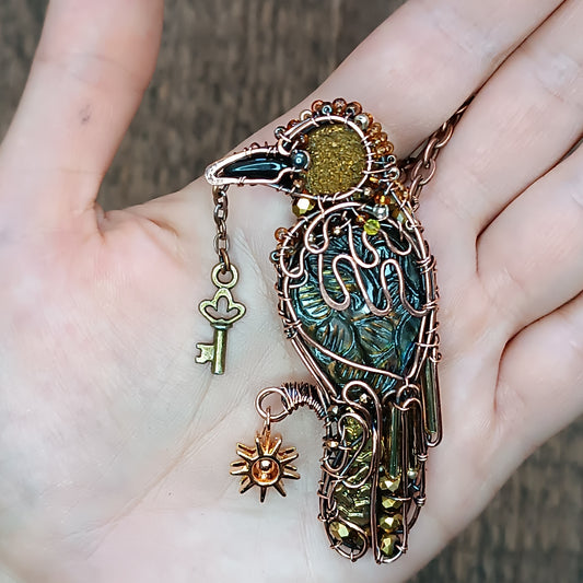 Secret keeper and The Sun. Raven necklace.