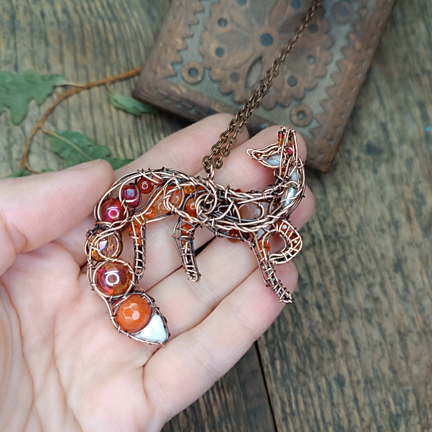 Foxy the swoopy tail! Copper necklace with carnelians.