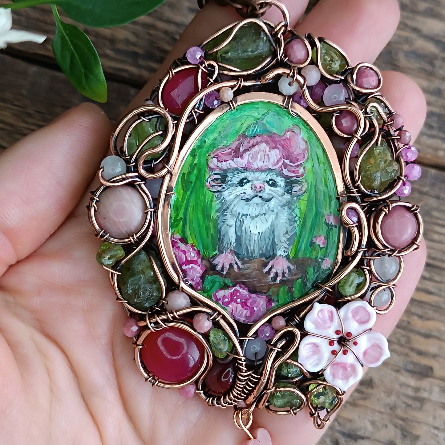 Charming possums and cherry blossom. Wire wrapped 2 sided necklace with miniature paintings