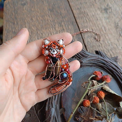 For Hanne. Red panda pendant