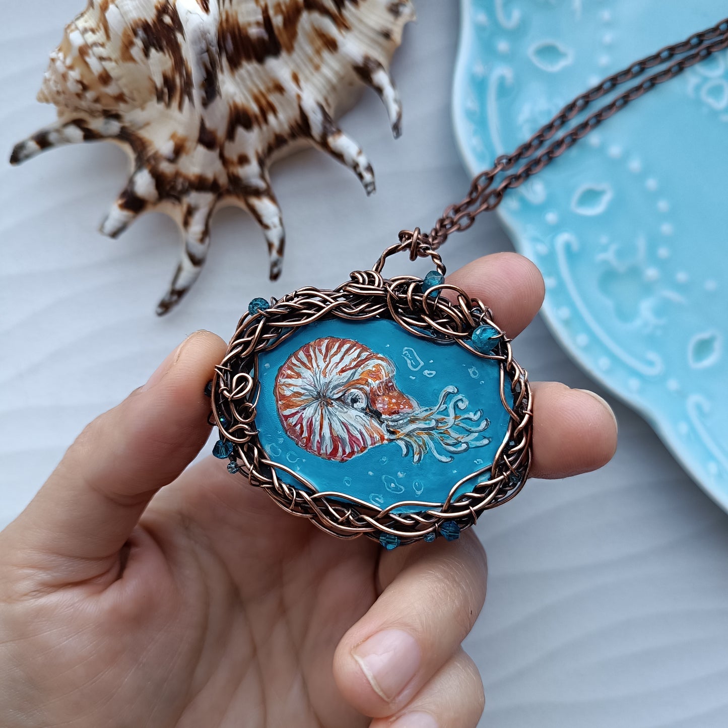 "Unforgettable diving". Wire wrapped and hand painted necklace.