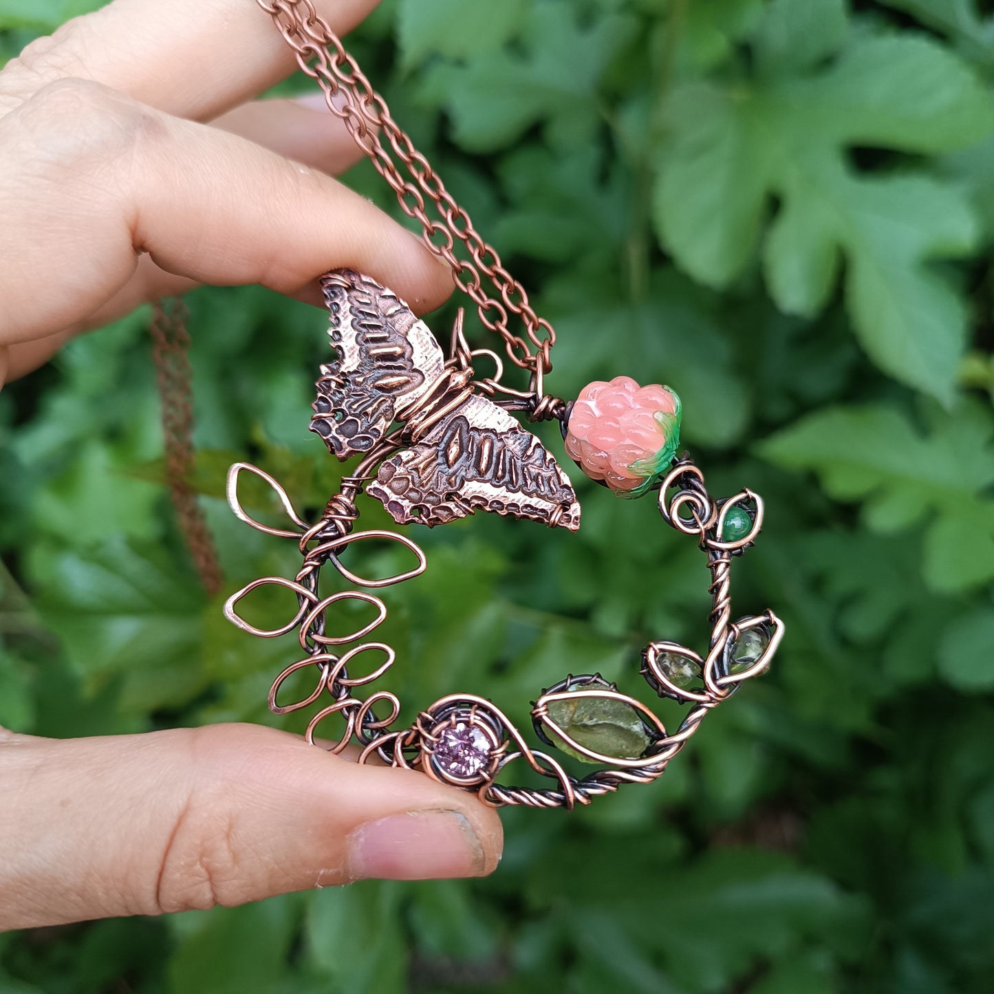 Life circle. Pink raspberry butterfly necklace
