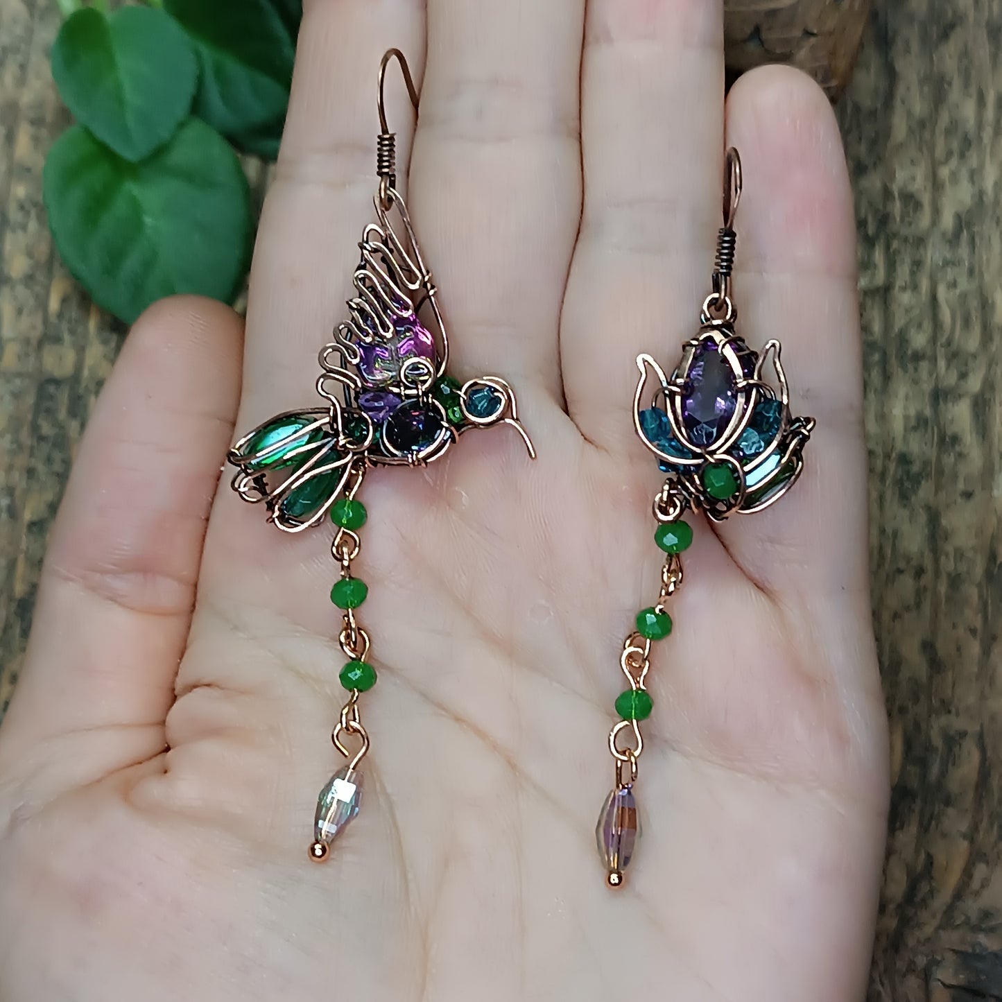 Humming bird and flower dangling earrings.