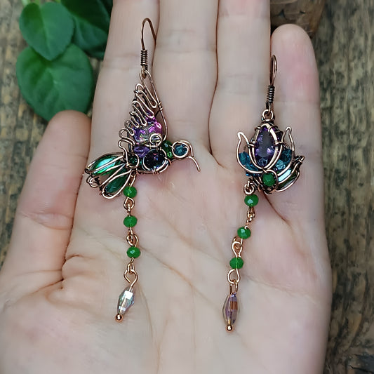 Humming bird and flower dangling earrings.