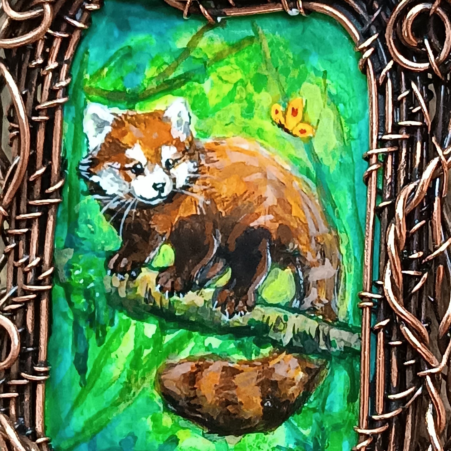 Red panda and a butterfly necklace. Reversible.