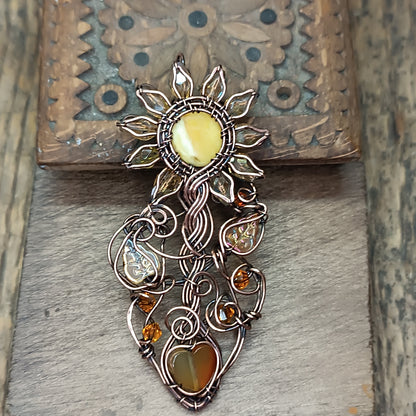 Sunflower pendant with carnelian heart root