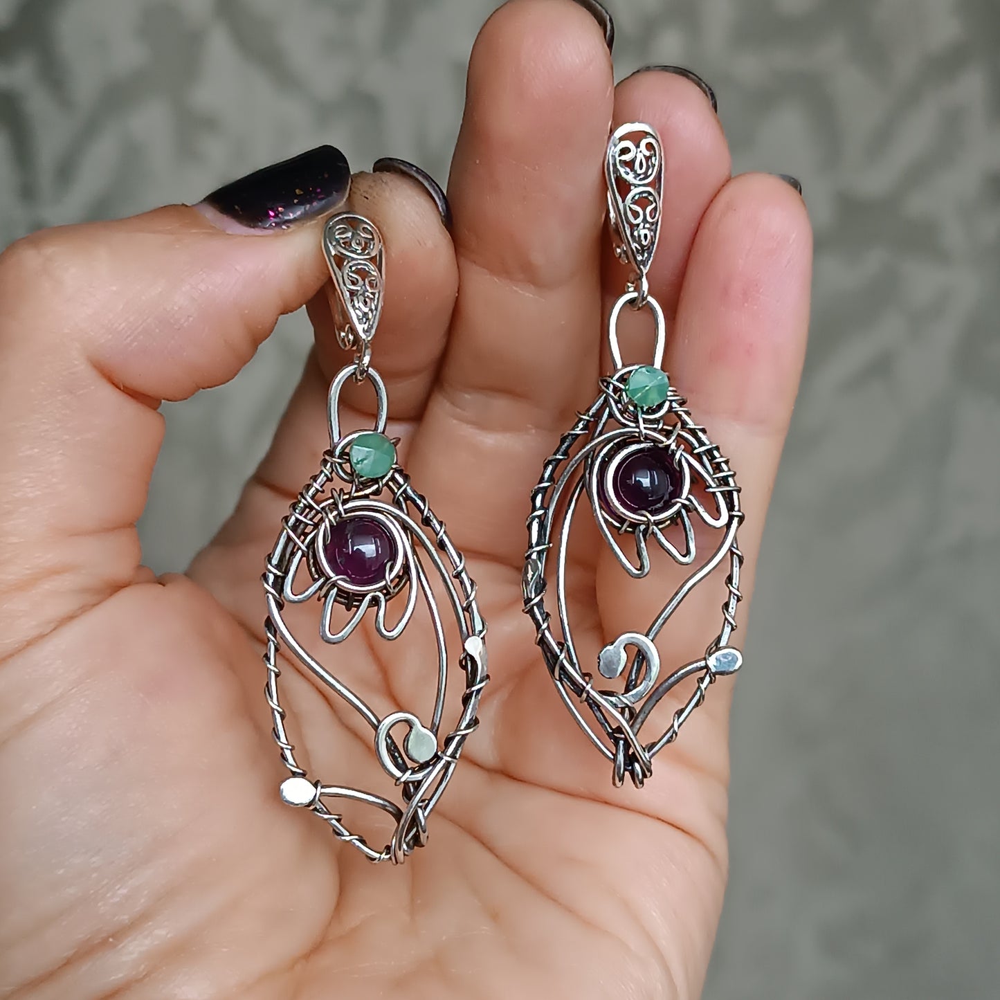 Silver dangling earrings. Amethyst bells.