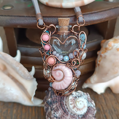 Heart of the ocean. Reversible vial necklace