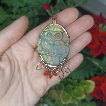 Owl sitting on a dogwood branch. Pendant.