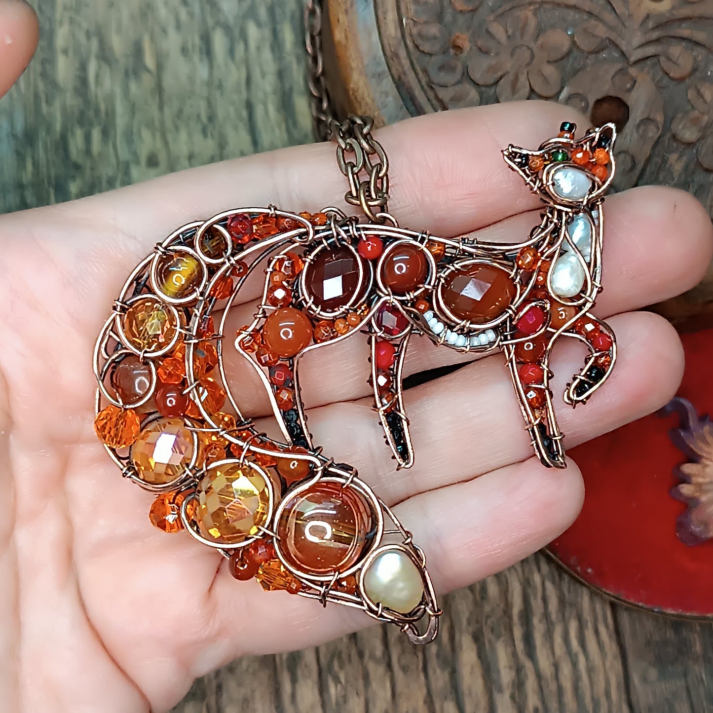 Swoopy tail Foxy. Sparkly wire wrapped pendant.