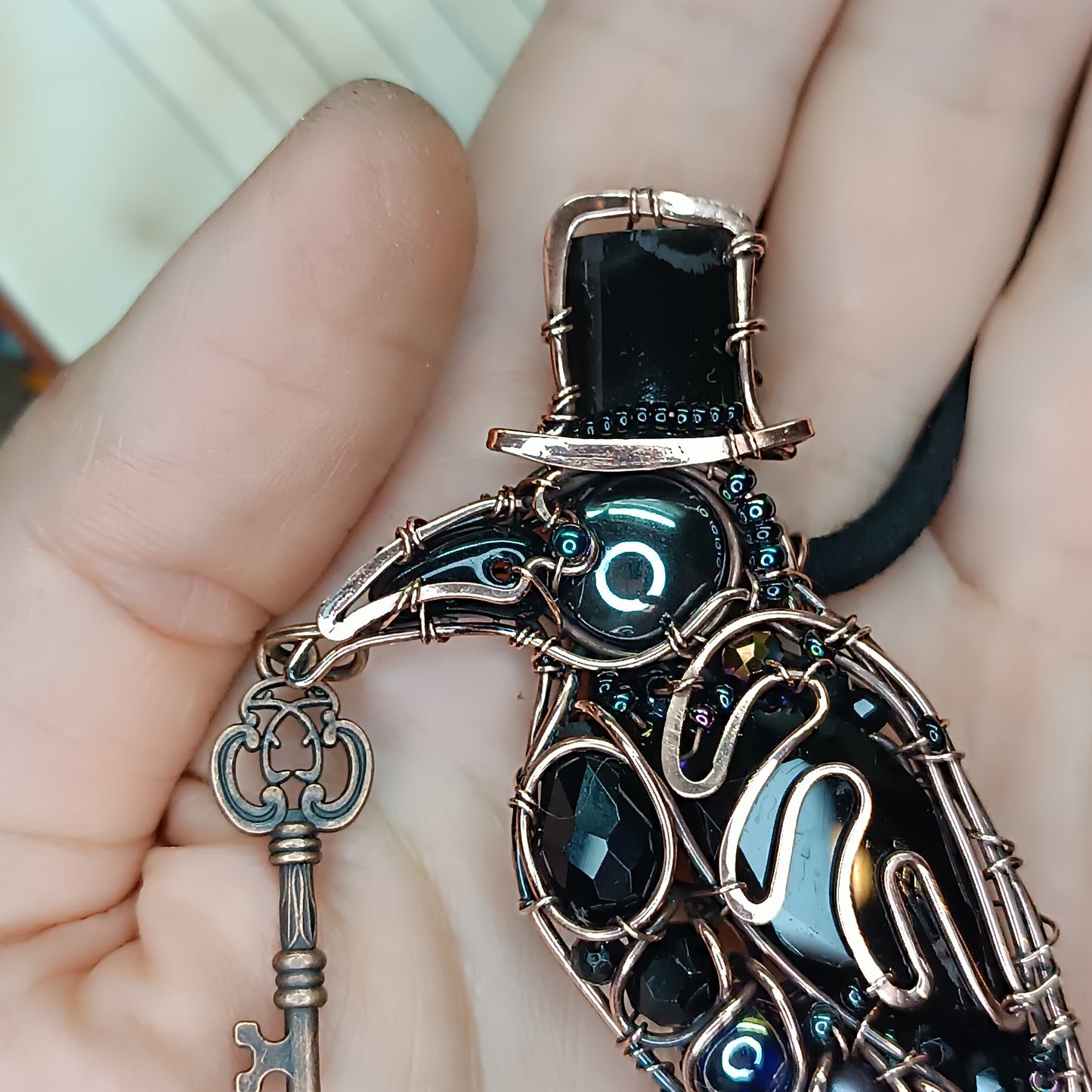 Mr Raven, the Secret Keeper necklace.