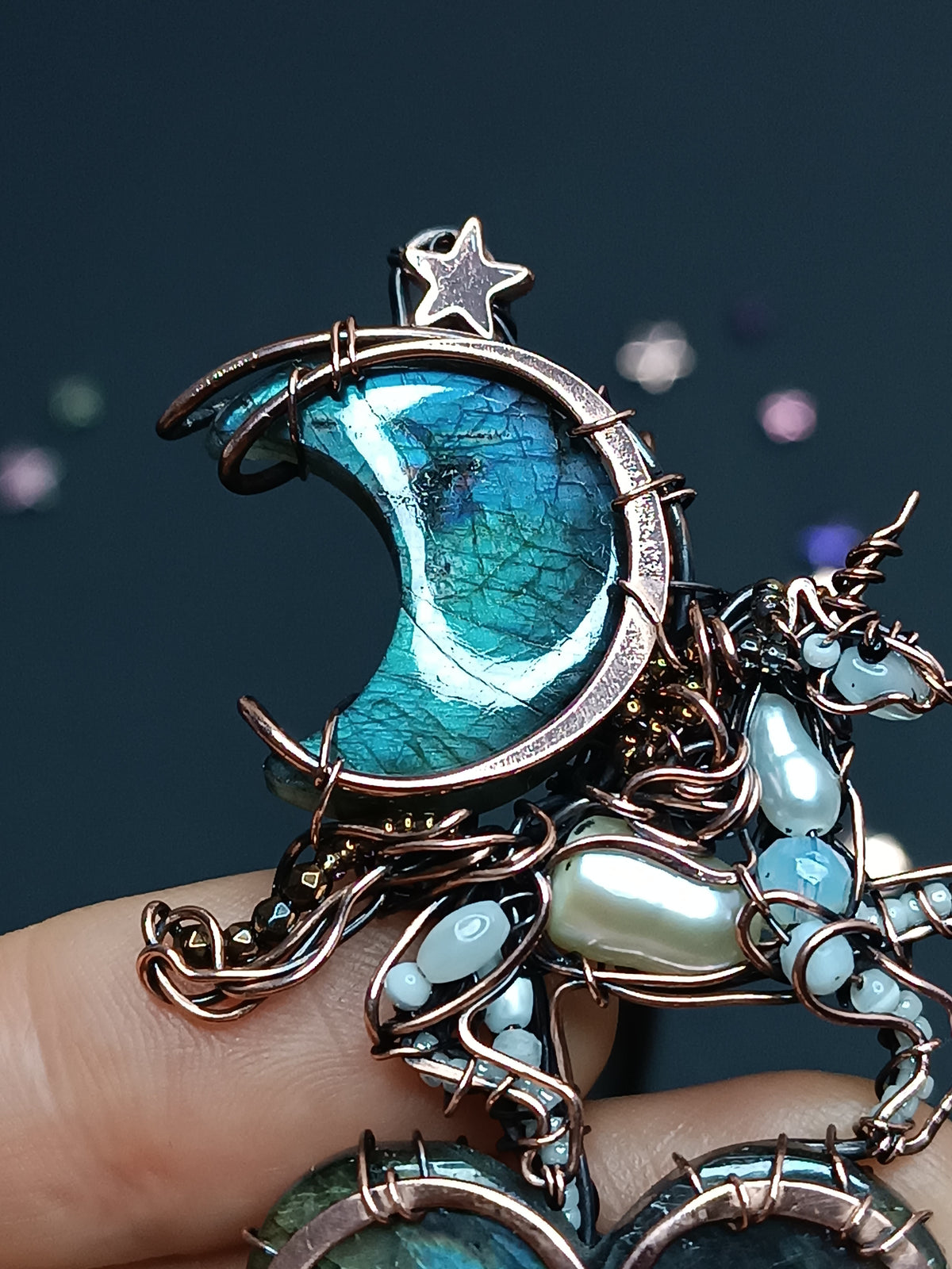 Space unicorn necklace.