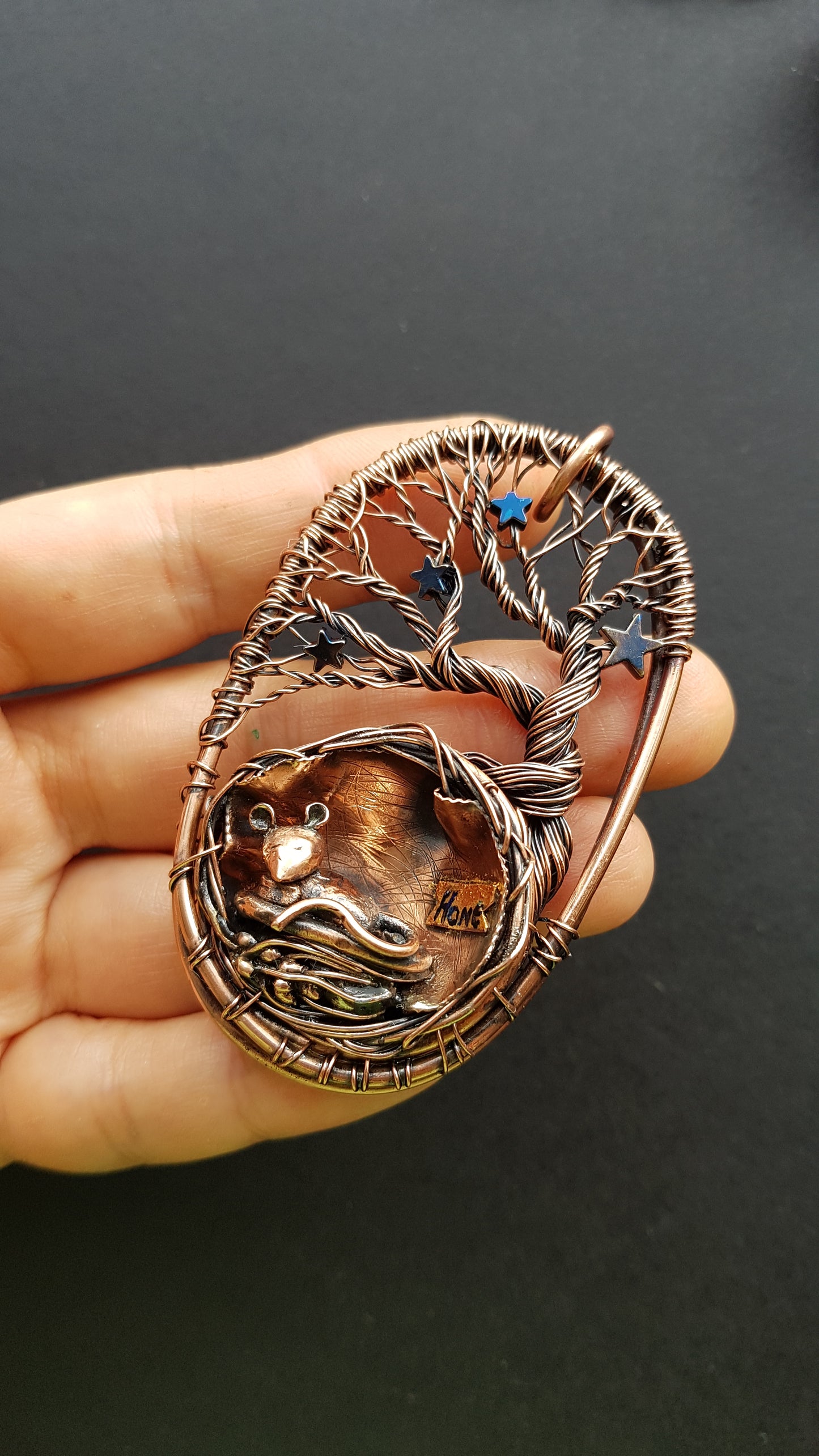 Mouse in the nest necklace.